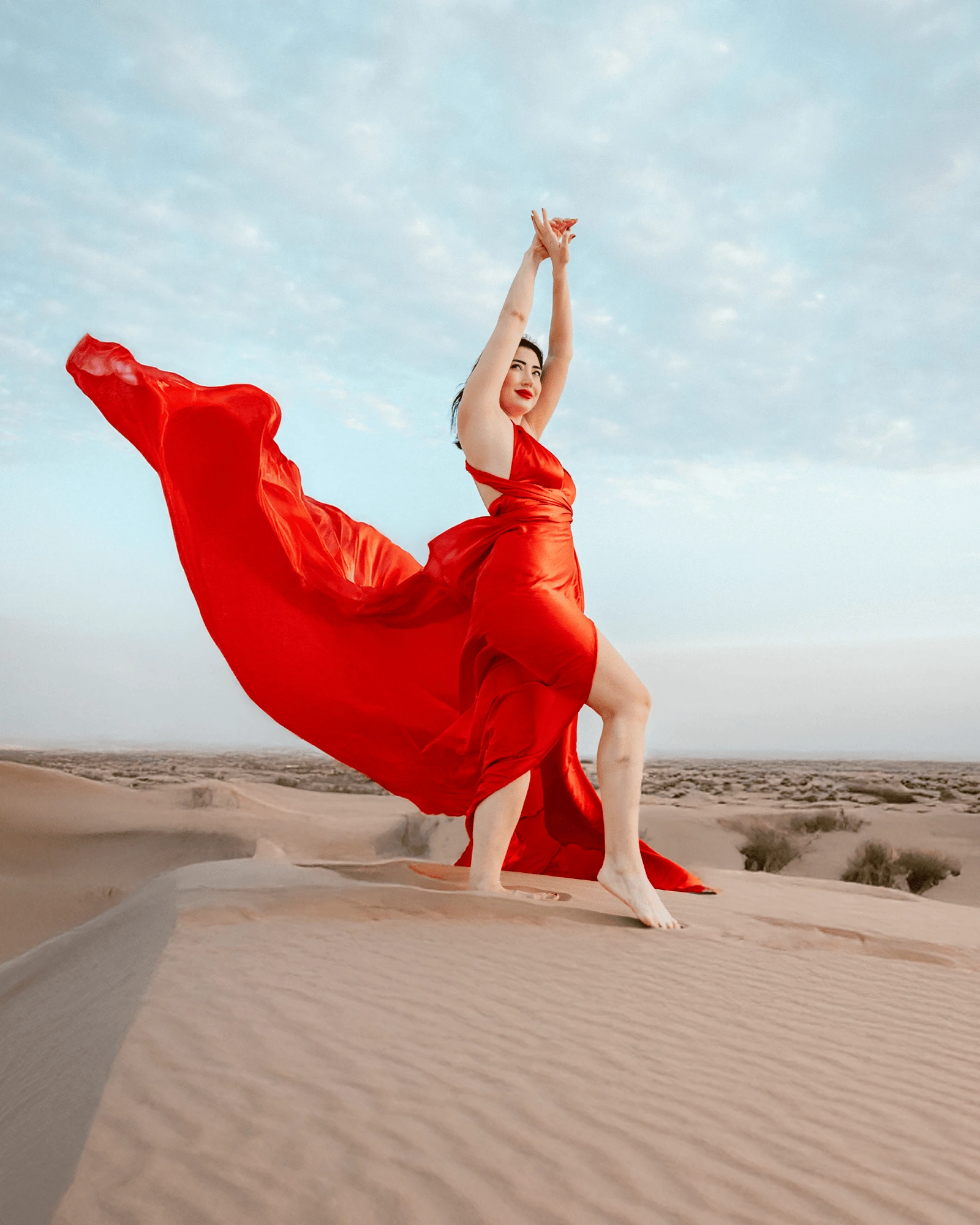 Solo woman flying dress photography session in Dubai dunes