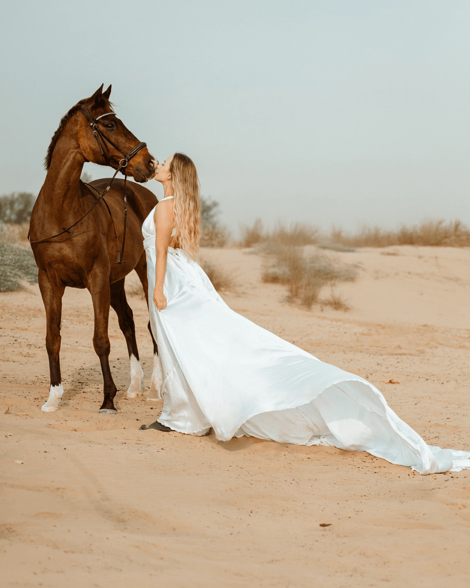 Solo woman flying dress photography session in Dubai dunes